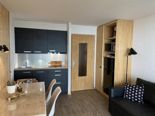 Köök või kööginurk majutusasutuses Gentianes COSY & MOUNTAIN apartments