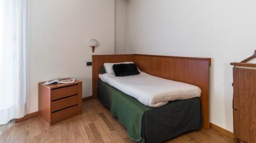 Ein Bett oder Betten in einem Zimmer der Unterkunft Residence Pizzo Scalino