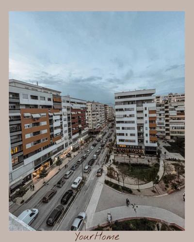 an aerial view of a city street with buildings at YourHome in Tirana