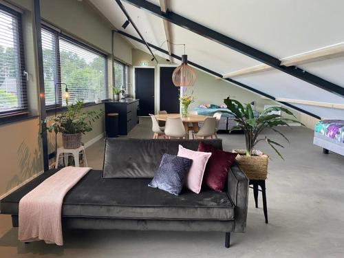 Posezení v ubytování Luxe Loft voor 4 personen