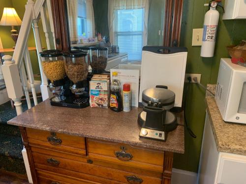 a kitchen counter with a blender on top of it at Bayberry House Bed and Breakfast in Steubenville