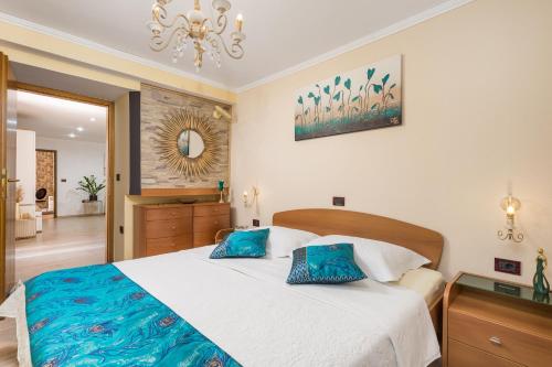 Postel nebo postele na pokoji v ubytování Villa Seastar