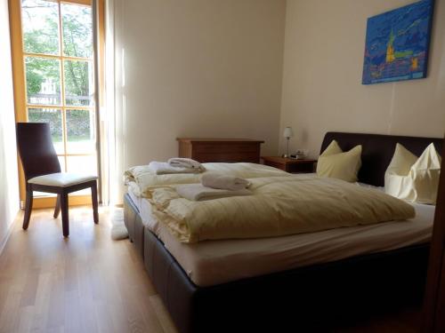 Una cama o camas en una habitación de Schoenblick Mountain Resort - by SMR Rauris Apartments - Inc Spa close to Gondola