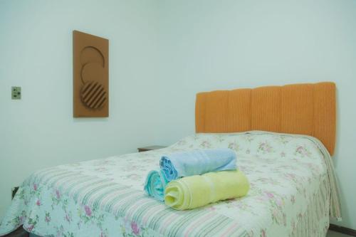 Postel nebo postele na pokoji v ubytování Casa ampla com área de lazer na praia em Ilhéus