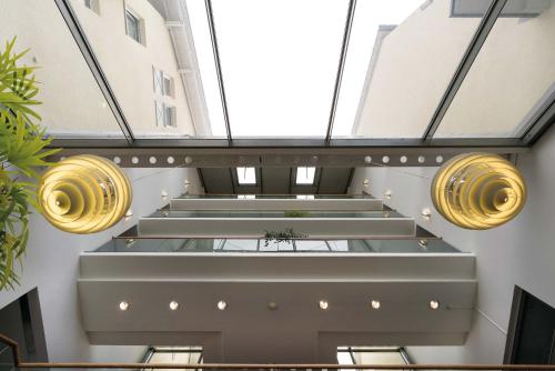 a view of the lobby of a building with stairs at Seminaris Hotel Bad Boll in Bad Boll