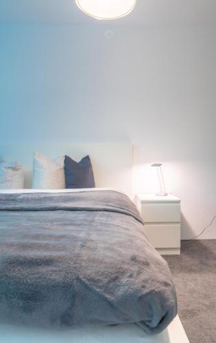 Cama o camas de una habitación en Urlaubsplatzl Appartements