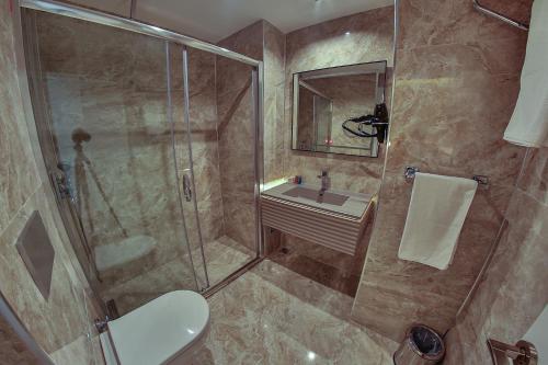 Kúpeľňa v ubytovaní Seymen Hotel