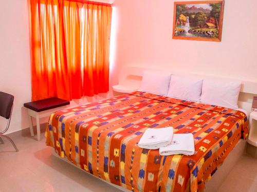 Кровать или кровати в номере Hotel Puerto Real - Coatzacoalcos