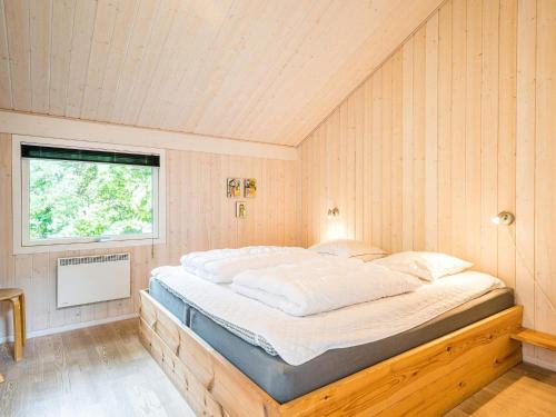 Postel nebo postele na pokoji v ubytování Holiday home Oksbøl LIV