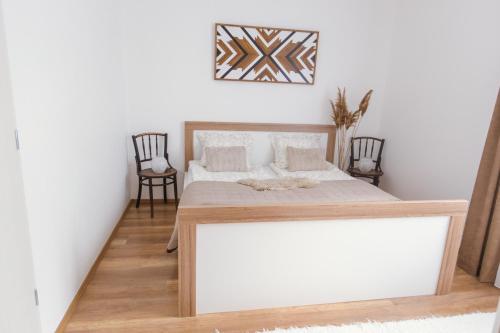 Posteľ alebo postele v izbe v ubytovaní BohoHome Apartment Eger
