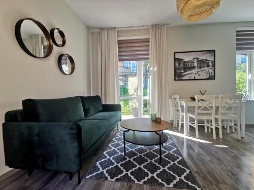 Posedenie v ubytovaní Apartament "Nad dachami"