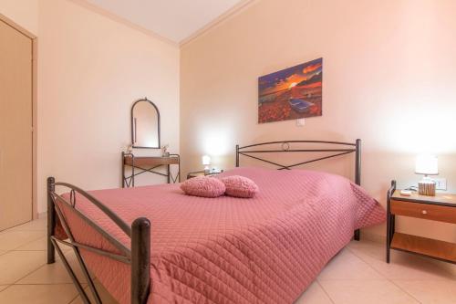 Кровать или кровати в номере Vila Elion Myloi