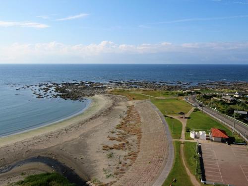 an aerial view of a beach and the ocean at Boso Shirahama Umisato Hotel in Minamiboso