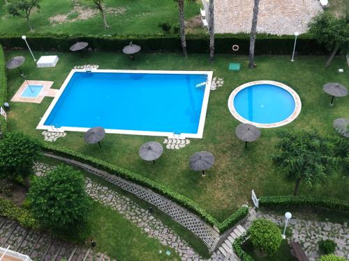Bazén v ubytování Apartamento Jardines del Mar El Campello, Alicante nebo v jeho okolí