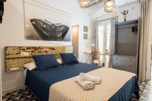 Llit o llits en una habitació de Casa Portus Gaditanus s XVIII Patio Andaluz