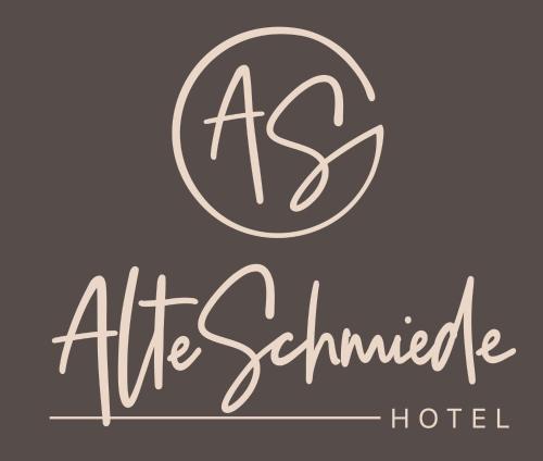 Aparthotel Alte Schmiede Dettelbachに飾ってある許可証、賞状、看板またはその他の書類