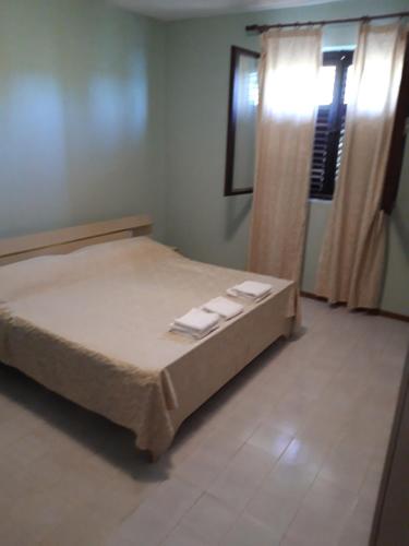 Postel nebo postele na pokoji v ubytování Apartman Marija