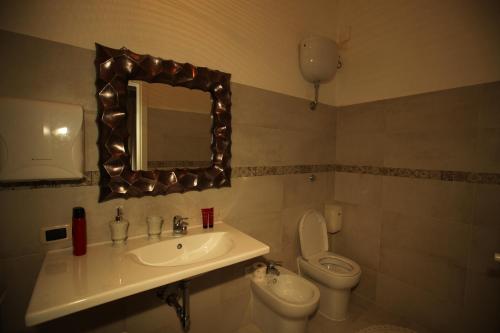 Koupelna v ubytování LE ZAGARE B&B - Ares