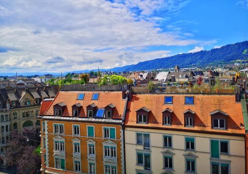 a view of a city from a building at Guesthouse Lochergut in Zürich