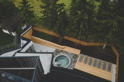 an overhead view of a building with a pool at Arabella Retreat & Spa in Nauders