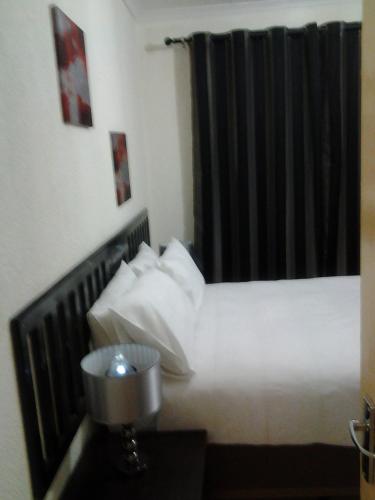 Postel nebo postele na pokoji v ubytování Bushbuckridge Micanolia Guest House