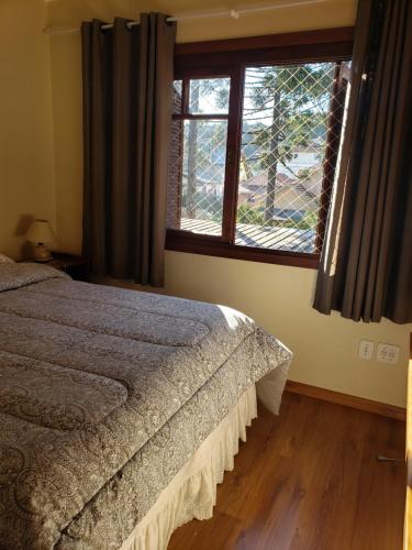 Een bed of bedden in een kamer bij Apartamento Flor de Canela