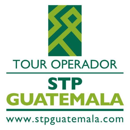 a sign that says tour operator stop guatemala at Villa Maya in Flores