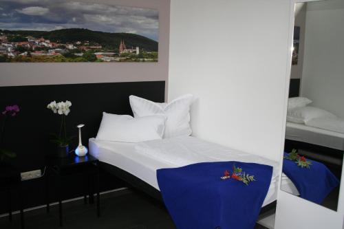 Katil atau katil-katil dalam bilik di Mar Hotel