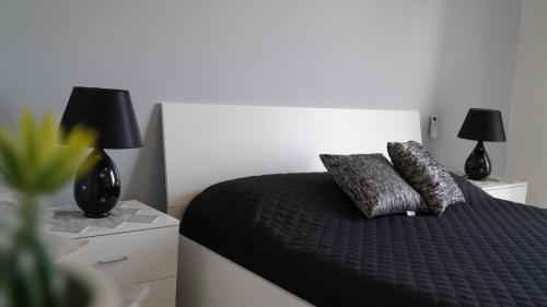 Postel nebo postele na pokoji v ubytování Deep Sea Residence