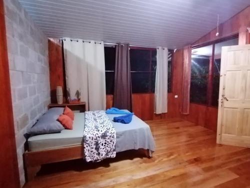 Ένα ή περισσότερα κρεβάτια σε δωμάτιο στο The Sunset Tucano Lodge