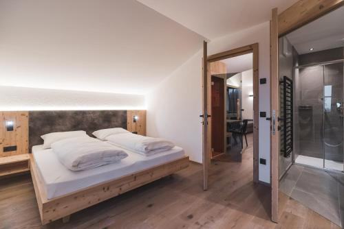Postel nebo postele na pokoji v ubytování Unterweckerlerhof
