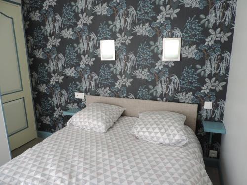 Ένα ή περισσότερα κρεβάτια σε δωμάτιο στο Villa Mes Souvenirs 1er étage Wifi Lit fait Taxe de Séjour Incluse