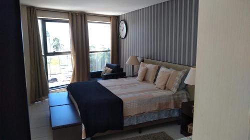 Ένα ή περισσότερα κρεβάτια σε δωμάτιο στο Betel Beach Flat Internacional Boa Viagem