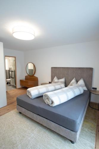Ένα ή περισσότερα κρεβάτια σε δωμάτιο στο Apartments Vorhöfe