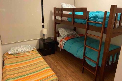 Postel nebo postele na pokoji v ubytování Hermoso apartamento de 2 dormitorios y 2 baños en Laguna del Mar La Serena