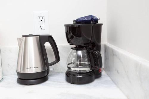 a coffee maker and a blender sitting on a counter at Prime Location - Awesome View -1 bedroom Apartment in San Diego