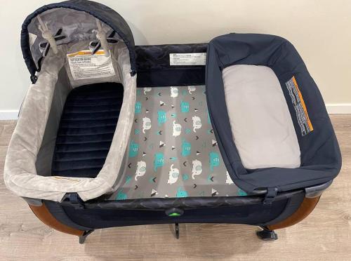 an open suitcase with a dog pattern on it at Spacious 1 Bedroom Apartment in Heart of San Diego in San Diego