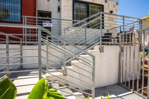 a set of metal stairs in front of a building at Spacious 500 sqft Studio with Balboa Park View in San Diego