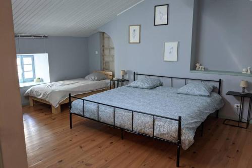 Posteľ alebo postele v izbe v ubytovaní Bienvenue au Barail, maison en pleine nature