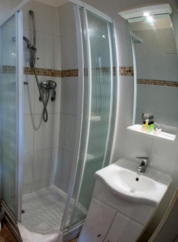 Koupelna v ubytování Thomas James Hotel