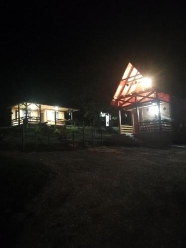 a house at night with lights on it at Brvnare Dunja 1 i Dunja 2 in Kraljevo