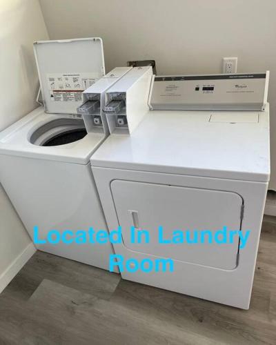 a white washer and dryer in a room at Explore Balboa Park From Your Cozy Studio w Patio in San Diego