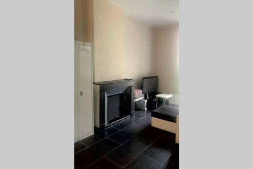 Voodi või voodid majutusasutuse T4 spacieux dans quartier le plus animé de Perpignan idéal pour visa pour l’image toas