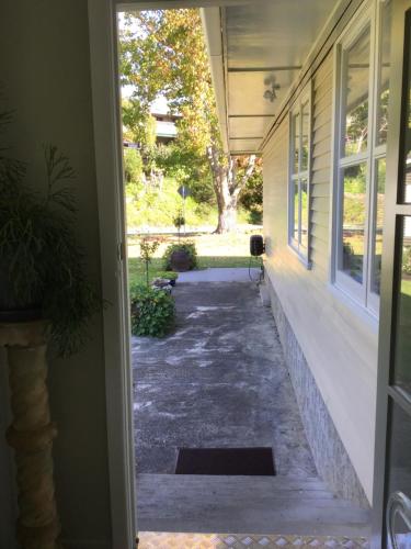 an open door to a porch of a house at THE AMBERS in Thames