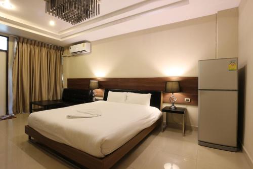 Posteľ alebo postele v izbe v ubytovaní HTel Resort