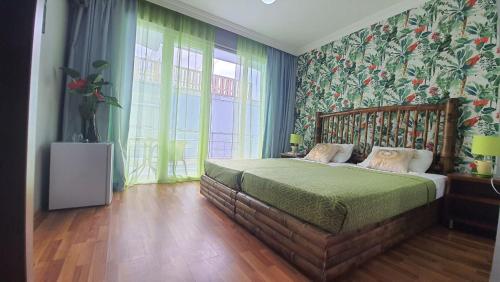 Cama o camas de una habitación en Calypso Kvariati Hotel