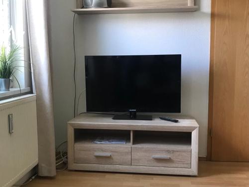 TV a/nebo společenská místnost v ubytování Ferienwohnung Familie Müller