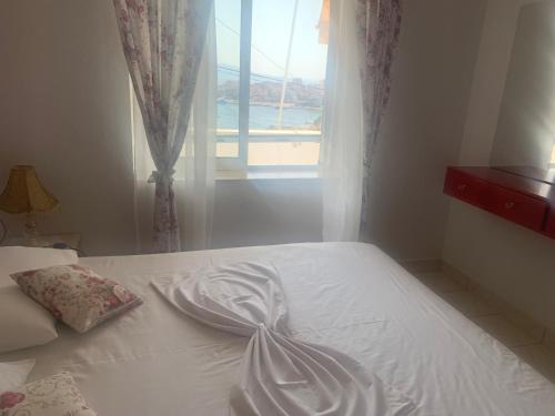 เตียงในห้องที่ VIEW apartment