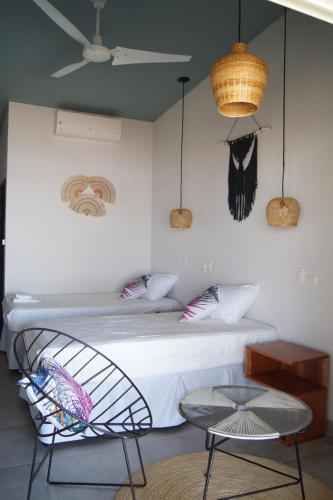 Una cama o camas en una habitación de Alive Beach House