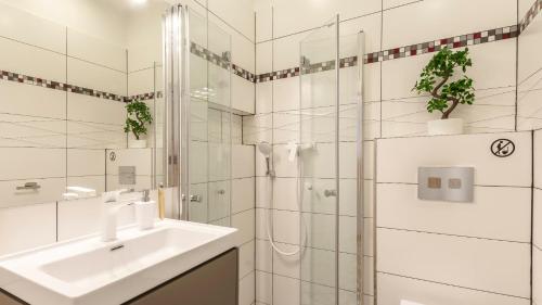 Koupelna v ubytování VacationClub - Trzy Korony Jagiellonów Apartament 9